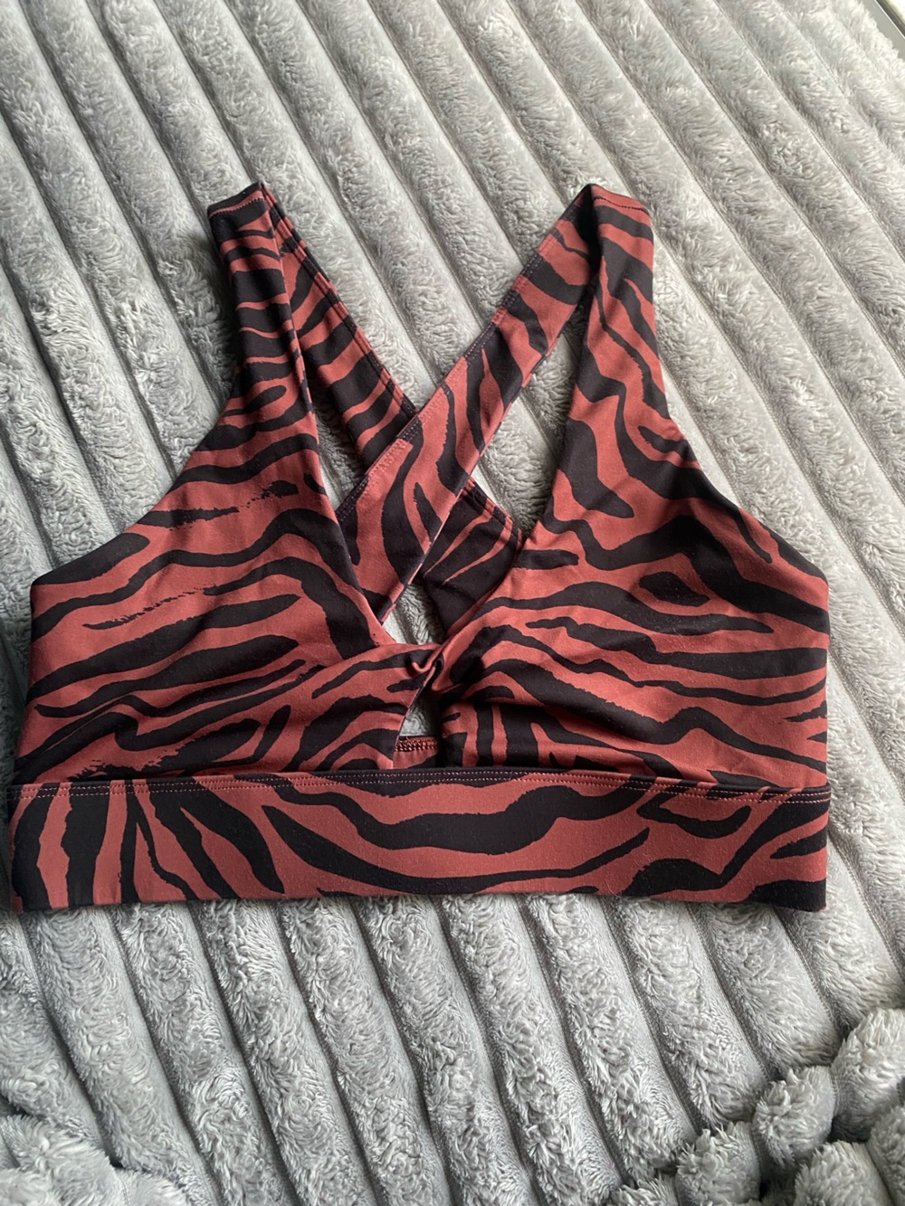 Fabletics Rust and Black Tiger-Print Sports Bra